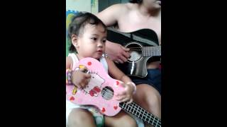 Daddy Gab and Ging on Guitar.