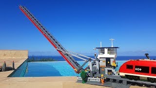 Working Lego train drawbridge MOC over the pool