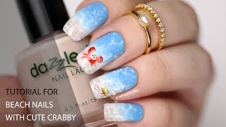 Ombre beach nails with watermarble splashes and crabby