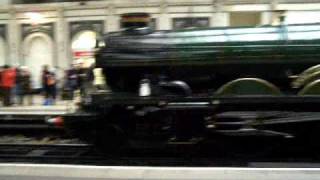 Castle at Paddington Station at Christmas Time. Boy looks up in wonder. Steam Train. We Three Kings