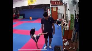 Painful fun:Taekwondo coach is perfectly kicked by his student at his genital with laughter