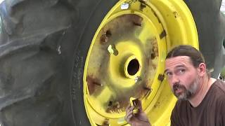 How to Take off a John Deere 820 Tractor Tire and Hubcap