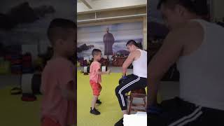 Wing Chun Master Ding Hao in Coaching children