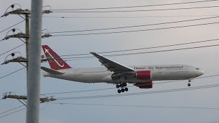 **VOLUME WARNING, WINDY** Omni Air International 777-200ER lands at BWI