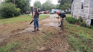 What did I get us in to? FOUND and REVEALED large section of DRIVEWAY. FREE cleanup for young lady