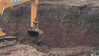 Case cx210b starting site excavation