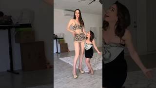 6'9 Tall girl towers over her friend