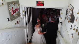 Paul and Lennette ' s grand entrance after hanging their lock!