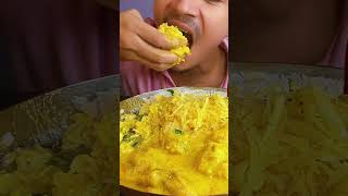 Eating tasty spicy Kadhi Pakoda Chawal