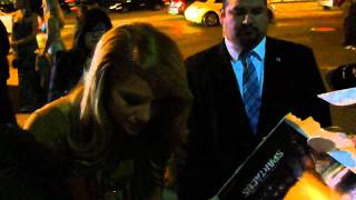 Ellen Hollman looking sexy signs autographs for fans at the spartacus vengeance premiere