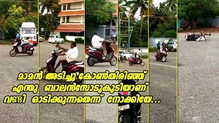 Drunken man driving two wheeler