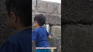 baby showing nature beauty under windows on the Gop mountain