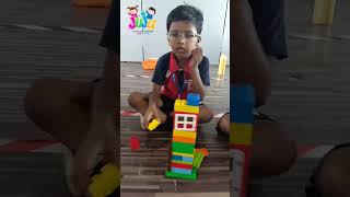 "Building big imaginations, one block at a time! 🧱✨  #CreativeKids #BuildingBlocks #JujuKids"