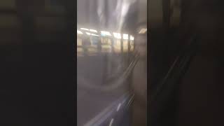 Manhattan bound E train thunders through 65th street.