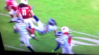 Sherman hits Larry Fitzgerald in the head 4 times!