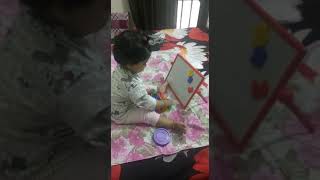 Avika Enjoying Magnetic number board 10 May 2020