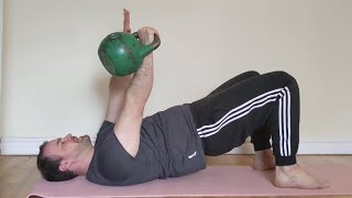 Single-Arm Chest Press from Hip Bridge