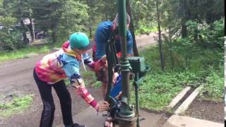 Pumping water at campground near McCall, Idaho