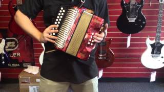 Luke testing out a Hohner Erica Accordion.mov