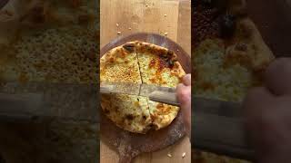 Baking Steel thin crust pizza at home.