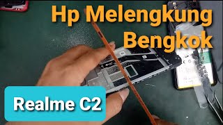 Solusi Realme C2 HP melengkung Bengkok