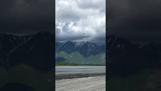 Helicopter towing airplane, Knik, Alaska