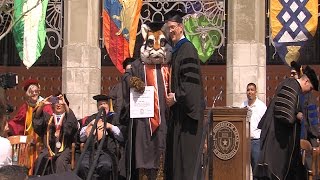 Ozzie the Ocelot receives his diploma from UT Brownsville at Legacy Commencement