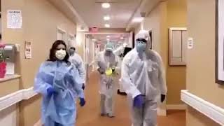 Healthcare Workers on the Frontline dancing to Bob Marley