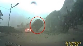 Amazing Footage of Boulder ALMOST Crushing Car