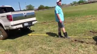 Ford F-150 on 35 Toyo AT's Pulling out four STUCK cars