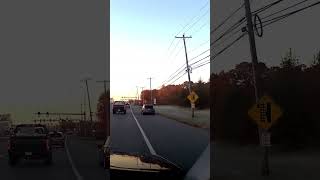 Moron using the side of the road to pass other cars