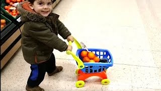 Little boy Doing Grocery Shopping -- Mini Shopping Cart