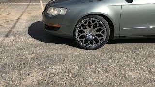 2006 Volkswagen Passat sitting on 20” AZA-504 chrome wheels wrapped around 225/35 Lexani tires.