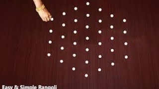 simple rangoli 7*4 dots🌺|easy rangoli|daily use rangoli|#muggulu #trending