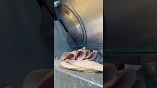 ASMR cutting turkey breast with a meat slicer