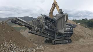 Kelowna's TNT Trucking crushing & grinding Using Komplet Krokodile making 3 1/2 minus m/f Fill