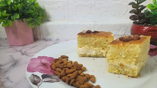 كيكة البسبوسة المحشوة بالقشطة الشهية واللذيذة علئ طريقتي ام عمار 😋😋🌹