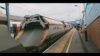 69009 Western Consort heading slowly through Peterborough Station platform 6 to Goole Glassworks.