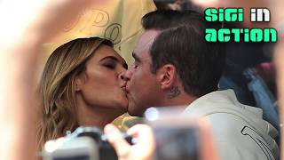 ROBBIE WILLIAMS kisses his wife Ayda @ Marc O'Polo in Munich