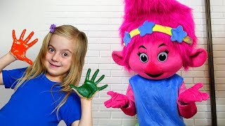 Girl pretend play  with Mommy and Troll