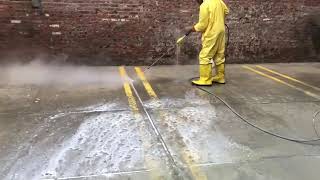 Pressure Washing The Neighbor's Building Dirty Concrete | All Bright Services