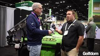 Caleb Myers from Steel Green shows Seth Jones the SGXL applicator at the 2023 GCSAA Show