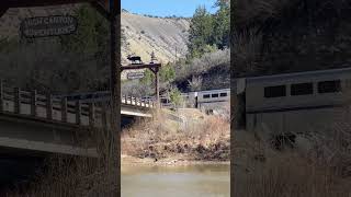 Amtrak crossing Glenwood Canyon rest area in Colorado.