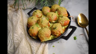 These Shami Kebab Sliders are a flavor bomb! Spicy sliders with a creamy sauce baked to perfection 👌