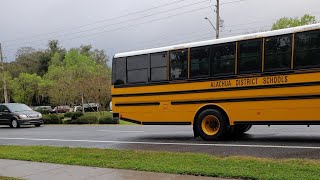 Cars waiting while the school bus picks children In Florida USA