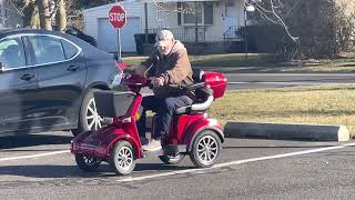 Army Veteran taking a ride on his new wheels, the Roadrunner E-4 Mobility scooter