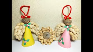 Angel craft idea from paper pistachios shell and acorn