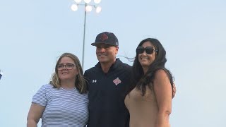 "They're the reason I'm here": Laney parents that saved New Hanover coach's life throw out first