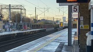 Great Northern Class 387 & LNER Class 91107 passing through Finsbury Park