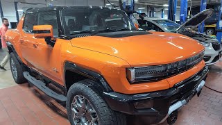 This Orange Hummer ev pickup truck 3x looks fantastic